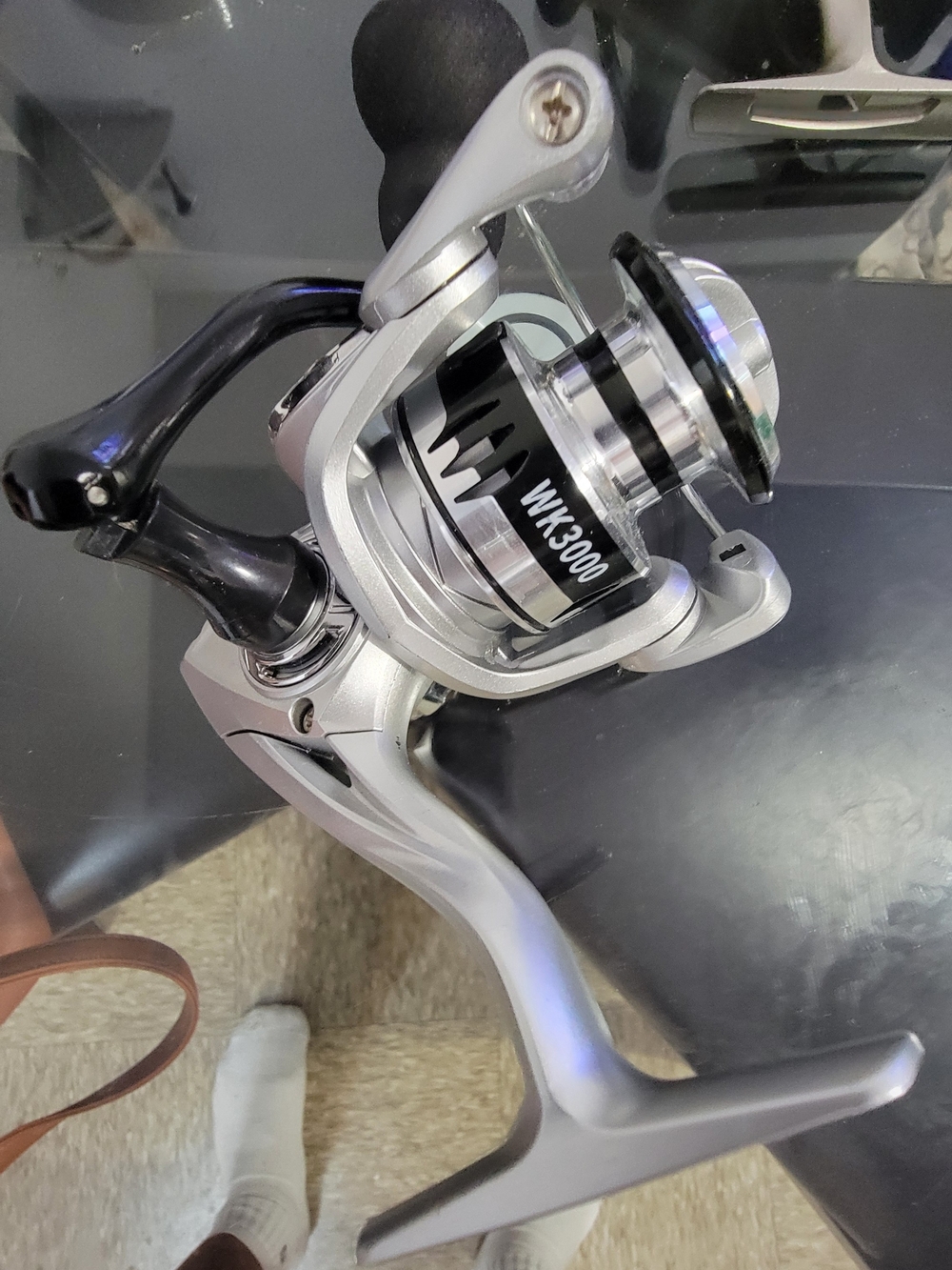 Silver and Black Spinning Fishing Reel